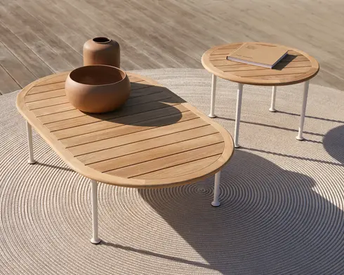 CURIO Coffee Table styled with outdoor decor, highlighting minimalist design.