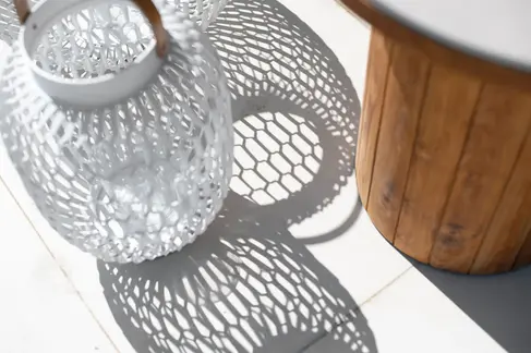 SWITCH Lantern – Shown in close-up, in a high-end residential outdoor setting as part of a modular furniture arrangement.