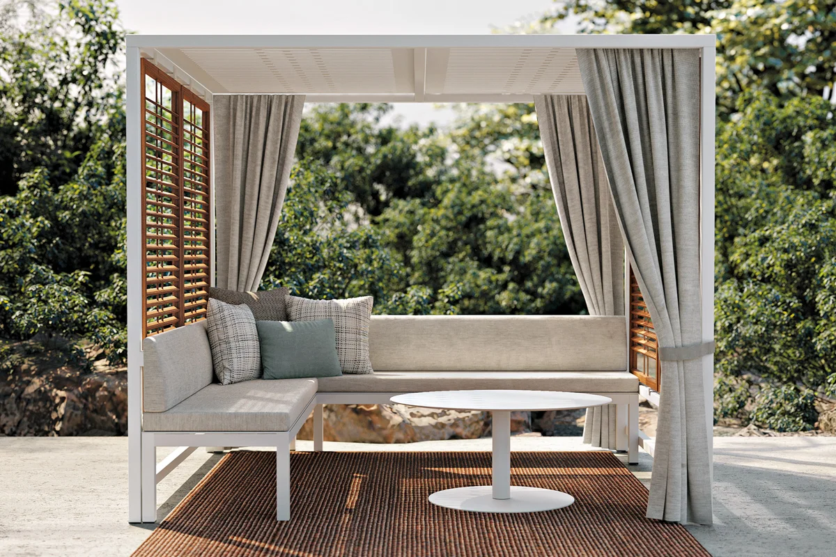 Alcova Collection lounge setup, offering shaded protection in an elegant outdoor design.