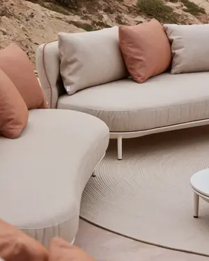 Amba Sofa with upholstered backrest.