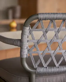 Close up of CURIO Bar Stool placed by kitchen, blending with contemporary decor.