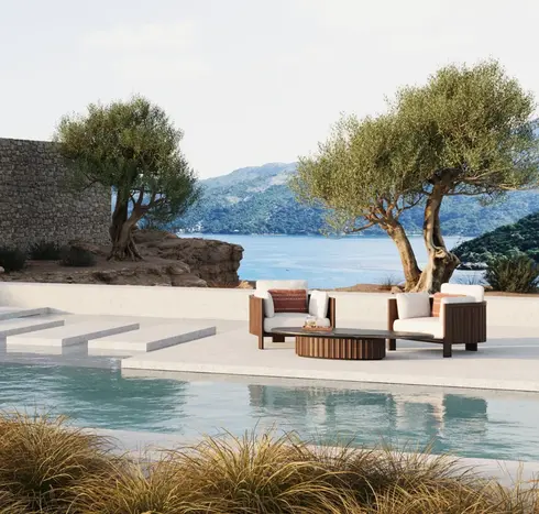 ZANTE Armchairs in a luxury residential outdoor lounge, showcasing refined seating and sculptural detailing.