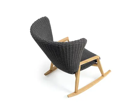 KNIT outdoor rocking chair in teak and woven rope photographed in studio setting