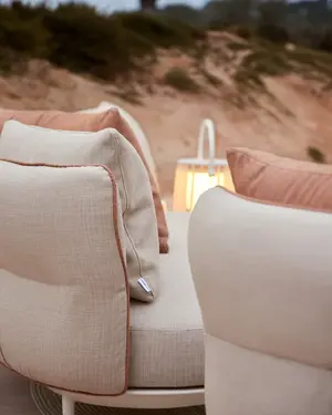 Amba Sofa with upholstered backrest.