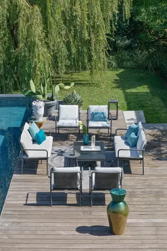 Top view of AIR outdoor lounge arrangement with coffee table and armchairs