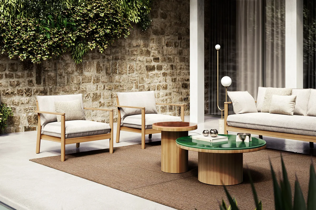 Outdoor rug anchoring a seating area, adding warmth and defining the space.