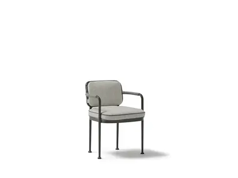 Wide studio shot of the CURIO Dining Armchair with braided rope backrest and cushioned seat.