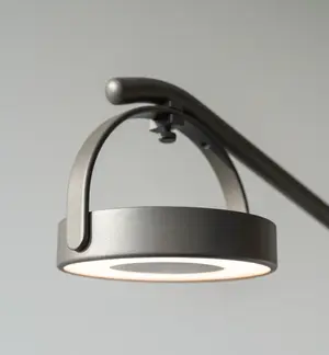 Close up of ORBIT Outdoor Lamp – Studio product shot of lamp with adjustable arm.