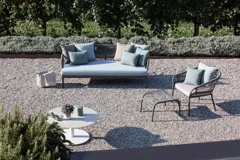 DREAM outdoor sofa with hand‑woven rope backrest, powder‑coated aluminium frame, and plush quick‑dry cushions.