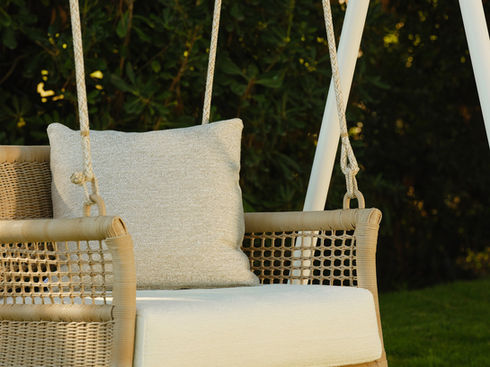 Close-up of the ESCALA Swing seat and woven fibre detailing