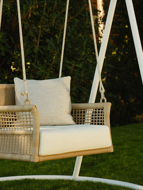 Close-up of the ESCALA Swing seat and woven fibre detailing