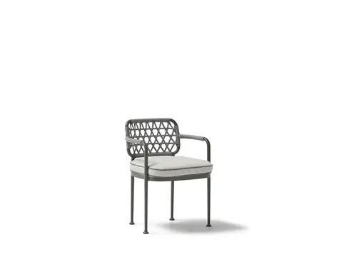 Wide studio shot of the CURIO Dining Armchair with braided rope backrest and cushioned seat.