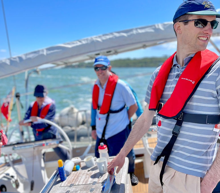 Students enjoying an RYA Competent Crew and RYA Day Skipper course with Academy Sailing whilst aboard sailing yacht Dream Odyssey