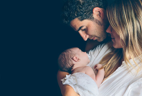 Parents Holding Newborn Baby copy.jpeg