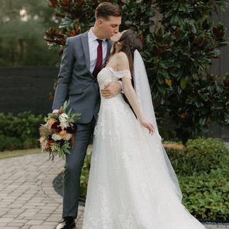 bride and groom with bouquet