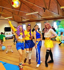 K-pop themed kids party entertainment featuring three dancers and one live singer performing an interactive concert experience at a children's birthday party.