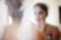 Indian Bride looking in mirror wearing her wedding dress after getting her hair and makeup done by Aluminus. “Aluminus expert mobile makeup and hair services creating flawless looks for weddings and special events across Sydney, Hunter, Newcastle and Central Coast”
