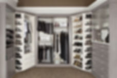 Walk in grey wood clost with 360 organizer to store clothes, shoes shelvs, doors, drawers, & moe