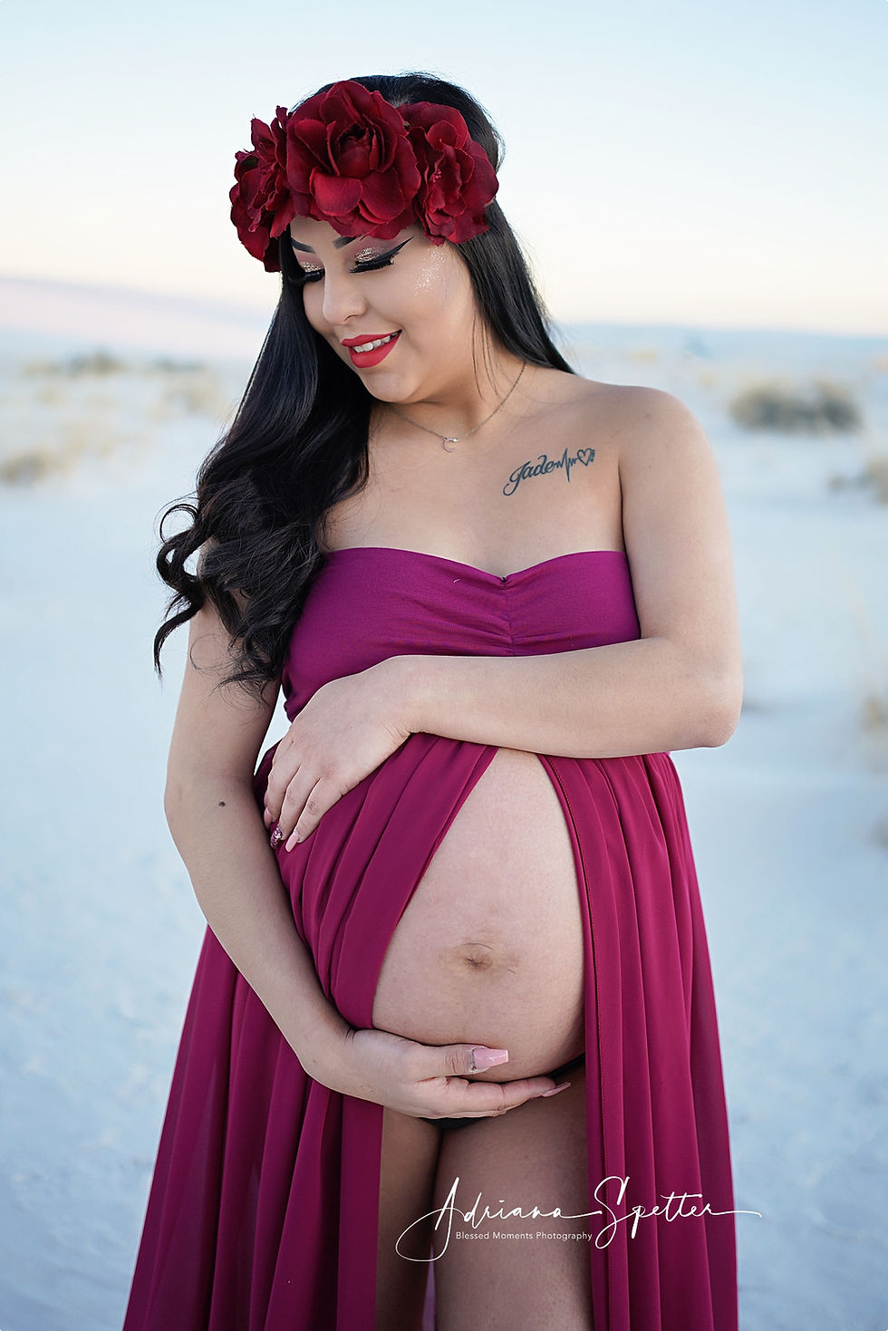 Mama cradling her belly in Maternity photo