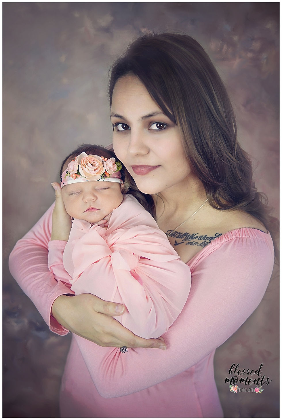 Mother holding her newborn baby