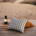 Striped cushion on terrace in the desert