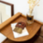 decorative wooden broom on coffee table