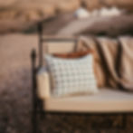 Striped cushion on outdoor sofa in the desert