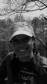 crazy woman smiling trying to hide her crazy