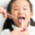 dentist-examining-child-teeth-dental-clinic (1)_edited.jpg