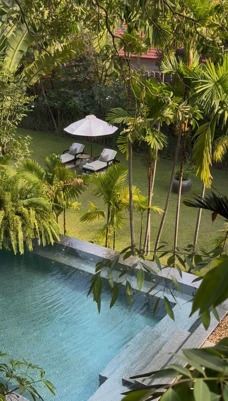 Jaya House pool and lake with floating seating