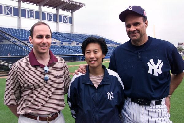 Ng pictured with GM Brian Cashman and Manager Joe Torre at Yankees Spring Training in 2000.
