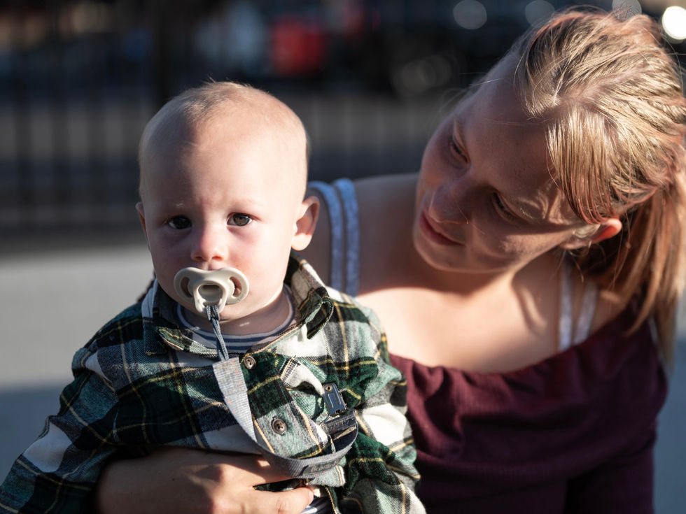 A woman watches her baby in Billings.