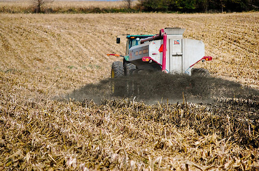 Spreading manure on a field. Image by the Chesapeake Bay Program