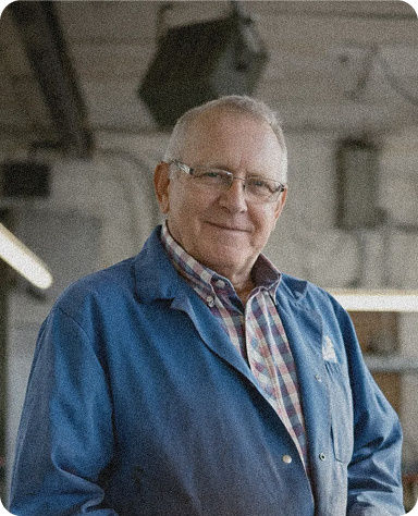 Business finances advice: older man in a workshop.