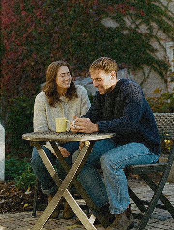 Protection advice case study: couple at an outdoor table.