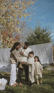 Financial advice services: family standing together in a garden.