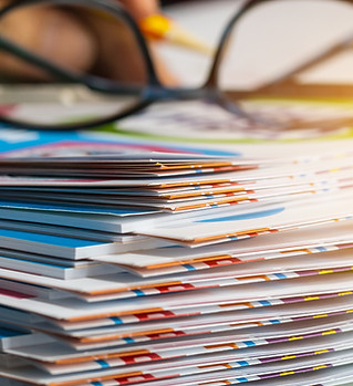 Stack of report paper documents for busi