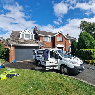 The Vaders van outside a home