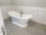 A bathroom with a new Karndean floor