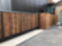 Large timber and metal commercial gate
