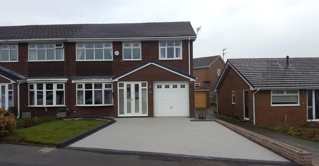 A large drive outside a house