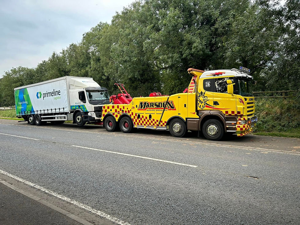 A lorry being recovered