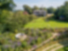 A large country home with beautiful garden