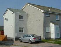 Two storey side extension in Aberdeen on a light grey rendered house