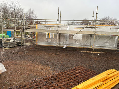 Scaffolding around a single storey new build