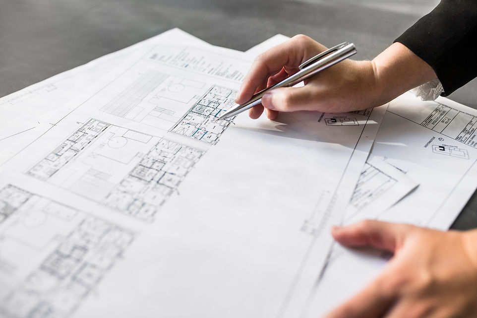 Person working on building plans