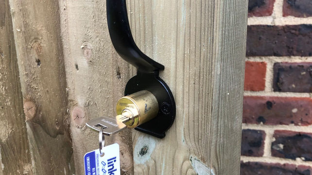 A Gatemate lock on a garden gate - external view