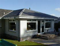 Spacious family room extension in Cults Aberdeen with a grey hipped roof