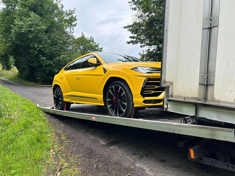 A yellow car being recovered
