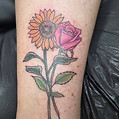 Sunflower and rose tattoo